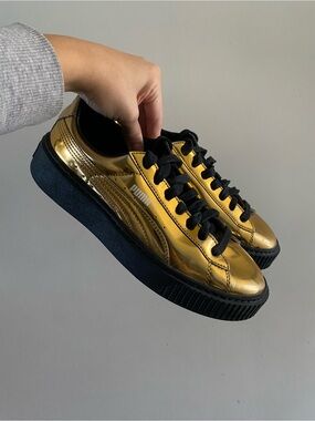 Puma Gold and Black Platform Sneakers